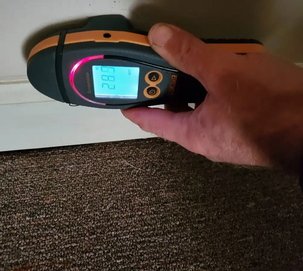 Moisture detection at baseboard during Storm Damage Restoration in Hellertown